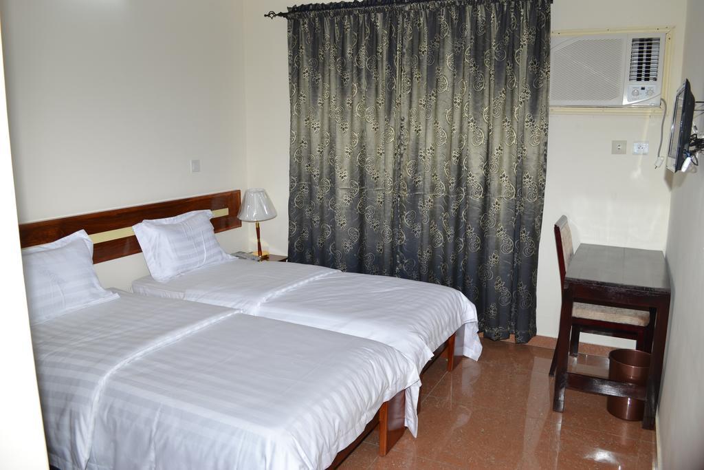Hotel Magnificat Lomé Chambre photo